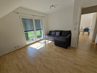 Wohnzimmer mit Schlafcouch