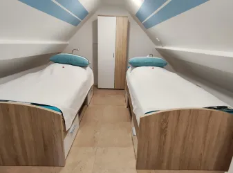 Schlafzimmer im Spitzboden
